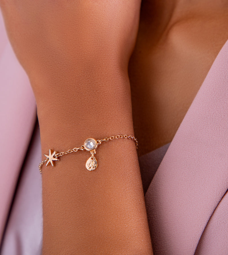 Star bracelet with golden charms